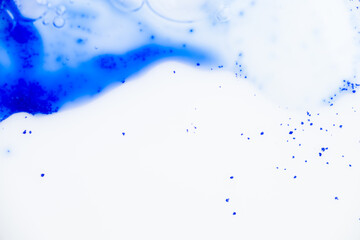 Close up of Blue Copper Peptides in Powder and Liquid Form