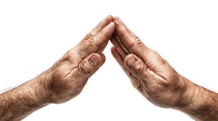 Fototapeta premium Two weathered hands clasped together, forming a roof-like shape against a black background. The hands are positioned symmetrically, showing creases and texture