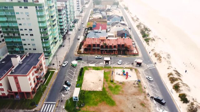 Aerial drone footage of Cap&atilde;o da Canoa skyline and coastline, Rio Grande do Sul, Brazil