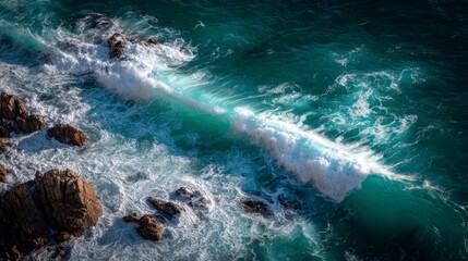 Ocean wave crashing over rocks