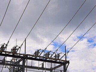 Transmission lines extending from insulator junctions of substation tower