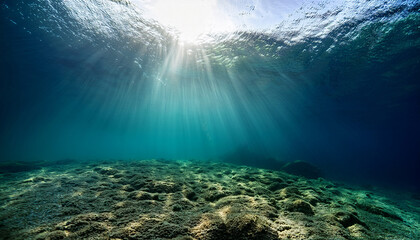 Obraz premium Sunlight S Dance Capturing An Underwater Perspective Sun Rays Pierce The Dark Serene Depths Revealing A Tranquil Scene Of Light And Shadow