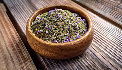A Wooden Bowl Filled With Dried Mountain Thyme Kekik Da Rests On A Wooden Surface The Aromatic Thyme With Its Greenish Purplish Hues Highlights Its Natural Flavorful Qualities