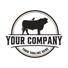Farm animal logo with bull silhouette and bird, isolated on white background