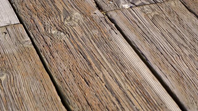 Close up pressure treat boards decking high foot traffic walkway boardwalk