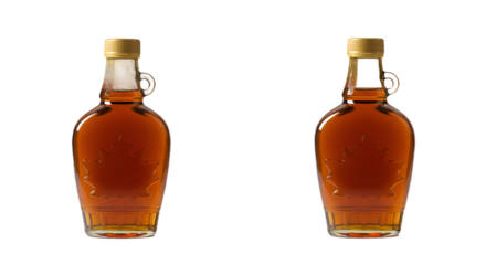 Two Amber Maple Syrup Bottles with Golden Caps and Embossed Maple Leaves