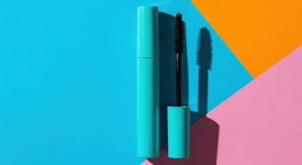 Obraz premium Turquoise Mascara on Colorful Geometric Background