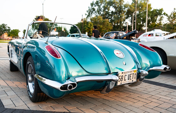 Park Ridge, Illinois, USA - August 22, 2024: Convertible car of Chevrolet Corvette C1. Chevy Corvette. Retro convertible car parked at auto show, back view. 1958 Chevrolet Corvette C1 retro car.