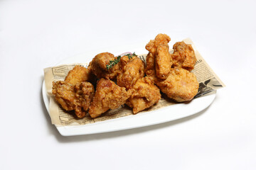 Crispy Korean Fried Chicken with Sauce and Beer – Traditional Asian Cuisine, Authentic Street Food and Popular Snack Dish Close-up