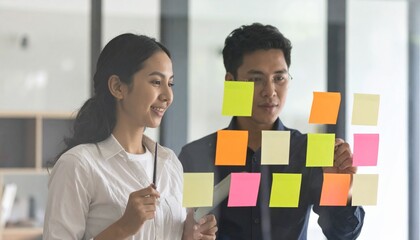 Young Professionals Brainstorming with Sticky Notes