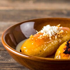 Golden, caramelized bananas in a bowl