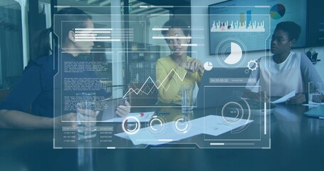 Reviewing colleagues discussing charts on laptop and papers in conference room with data overlays