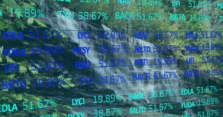 Fototapeta premium Cascading waterfall showing digital overlay percentages in forest, rocky ledges and foliage