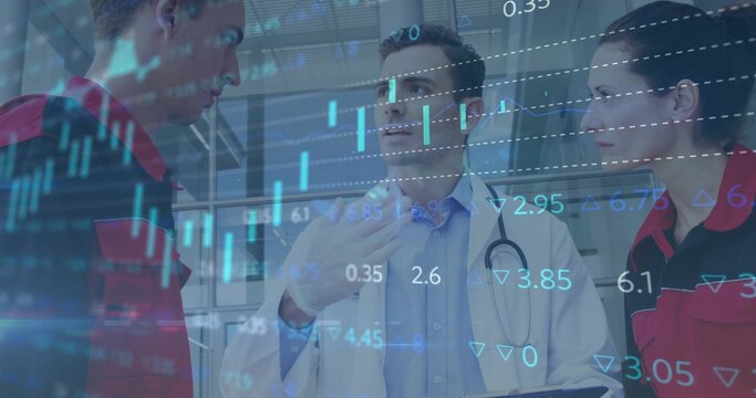 Discussing doctor and paramedics reviewing data in clinic corridor with stethoscope, digital charts