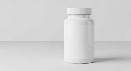 A plain white pill bottle stands alone on a clean, minimalist white surface.