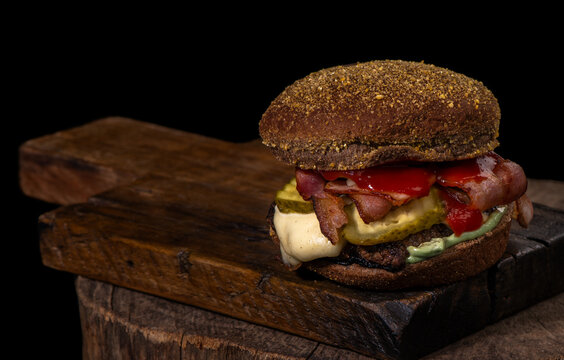 Rustic Gourmet Burger on Wooden Board