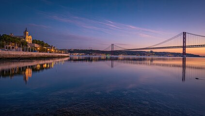 Fototapeta premium Calm river reflecting a sunrise cityscape