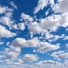 Obraz premium A serene sky filled with fluffy clouds and vibrant blue hues.