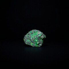 Fototapeta premium Macro shot of a rough emerald crystal with vibrant green facets on a black background