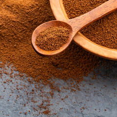 Dried organic coffee powder in a spoon and bowl - Coffea
