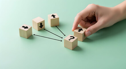 Decision-making process visualized with wooden blocks and arrows, strategic planning concept