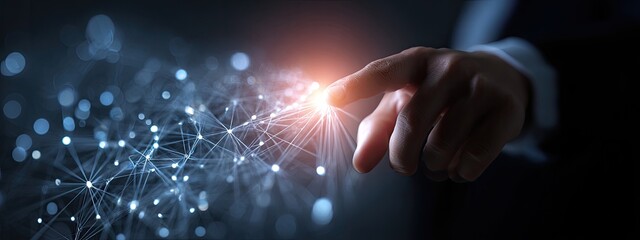 A hand points to a network of glowing lines and dots