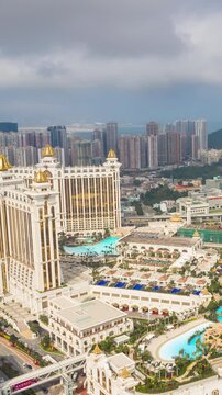 sunny day macay city famous hotel area construction aerial vertical panorama 4k timelapse china 