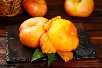 Fresh Shandong Peaches Sliced on Slate Board - Juicy Orange Fruit from Chinese Orchard