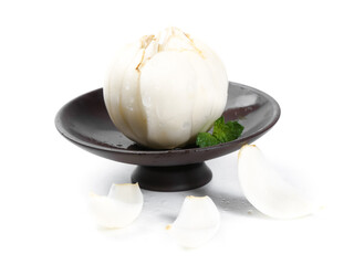 Fresh White Lotus Flower Bud in Dark Ceramic Bowl on White Background