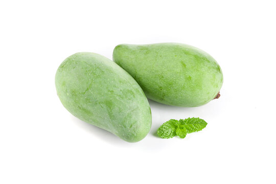 Fresh Raw Green Mangoes from Hainan Guangxi China with Mint Leaves on White Background