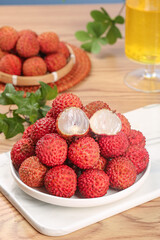 Fresh Lychees from Lingshan Zengcheng China on White Plate Showing Sweet Translucent Flesh Traditional Tropical Fruit