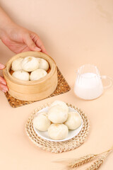 Freshly Made Xiao Long Bao Chinese Soup Dumplings in Bamboo Steamer Traditional Dim Sum