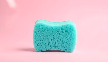 Light Blue Cleaning Sponge on Pink