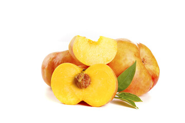 Fresh Ripe Peaches Sliced and Whole with Yellow Pulp on White Background