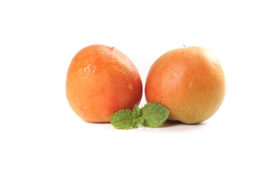 Fresh Apricots with Mint Leaf on White Background