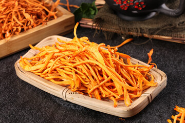 Traditional Golden Cordyceps Herbal Medicine Mushrooms on Bamboo Tray for Healthy Natural Formula Ingredients