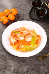 Fried Shrimp Stir-Fry with Bell Peppers on White Plate - Asian Seafood Dish