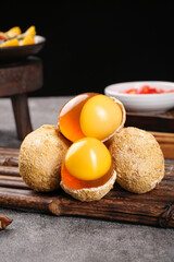 Free Range Golden Eggs Cracked Open on Wooden Cutting Board Kitchen Cooking Ingredients