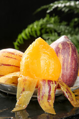 Fresh Desert Ginseng Fruit Slices from Gansu Minqin China with Colorful Striped Peel and Orange Flesh