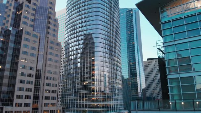 Modern office buildings in San Francisco, California, USA. The architecture is contemporary, with glass and steel structures reflecting the city's skyline. Salesforce Tower.