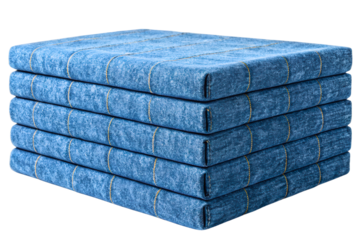 Stack of blue denim seat cushions with stitched grid pattern isolated with transparent background
