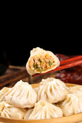 Fresh Steamed Dumplings with Thin-Skinned Wrappers in Bamboo Steamer Basket
