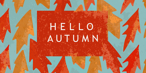 Hello autumn text on a background of stylized colorful falling leaves in red orange and yellow