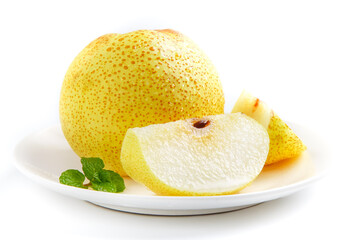 Fresh Dangshan Pears Sliced on White Plate with Mint Garnish