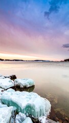 Frozen shoreline at sunset