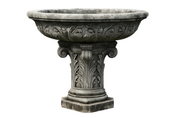 Antique carved stone garden birdbath on an ornate pedestal.