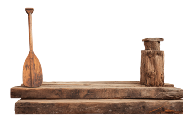 Rustic wooden raft with a paddle and post isolated on white.