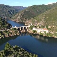 Scenic dam and reservoir in valley