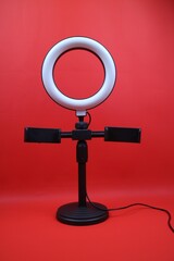Photography Ring Light on red Background for Professional Lighting Setup