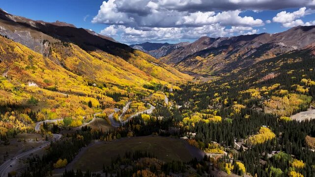 Drone Shot of Fall Foliage in Colorado Mountains with Million Dollar Highway